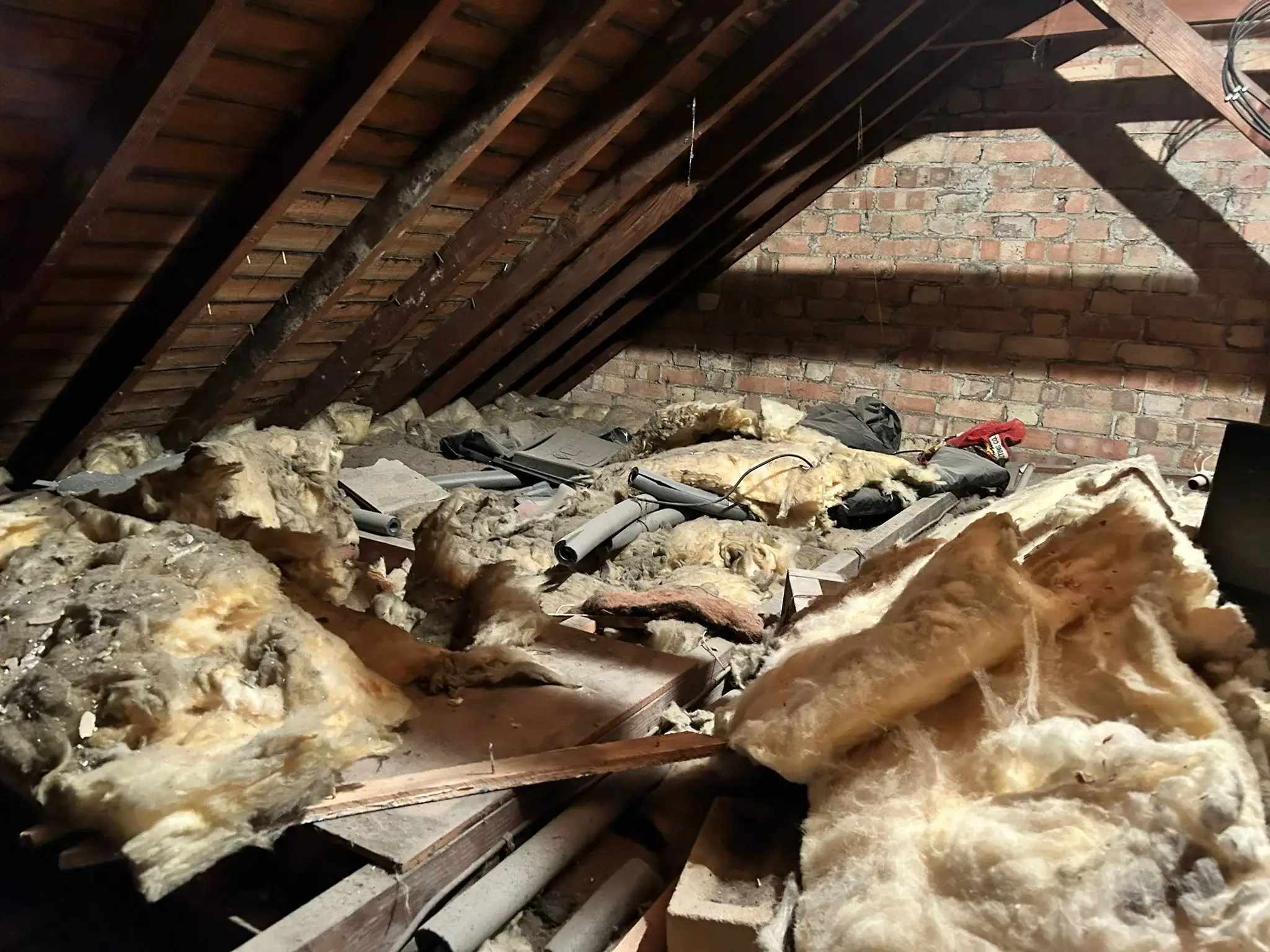Old-loft-insulation-removal-service-London.jpg